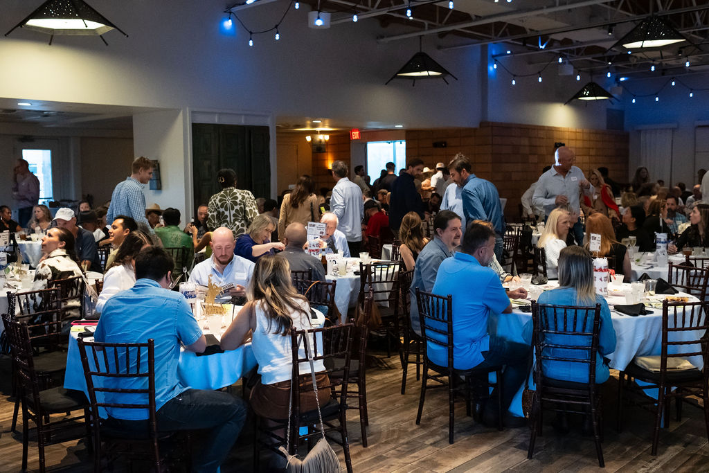 The full room at the 2026 Cowtown Classic dinner and auction