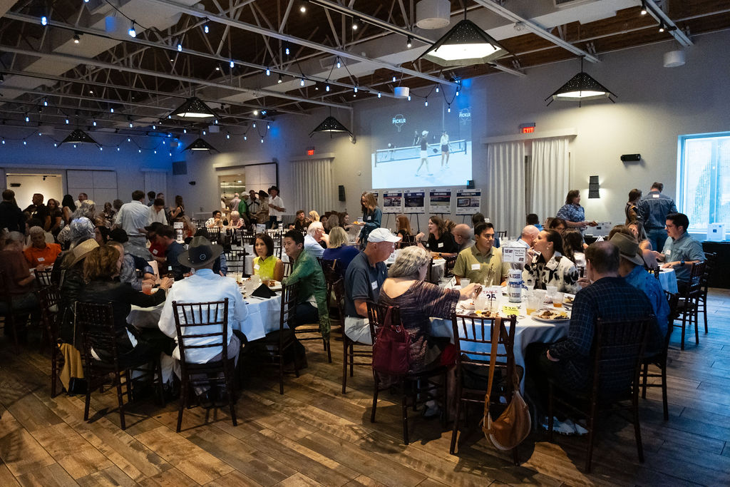 Wide view of the dinner and auction